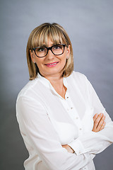 Image showing Scholarly attractive woman in glasses