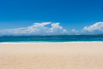 Image showing Beautiful tropical beach with lush vegetation