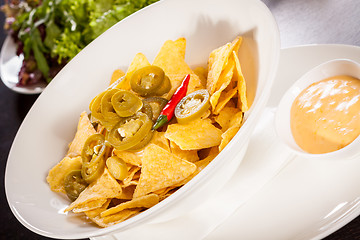 Image showing Nachos with cheese sauce and chilli pepperoni