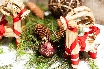 Image showing Red Christmas balls with pine cones