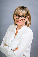 Image showing Scholarly attractive woman in glasses