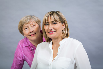 Image showing Senior lady with her middle-aged daughter