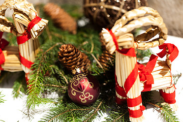 Image showing Red Christmas balls with pine cones