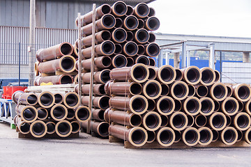 Image showing Plastic pipes in a factory or warehouse yard