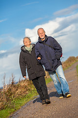 Image showing happy mature couple relaxing baltic sea dunes 
