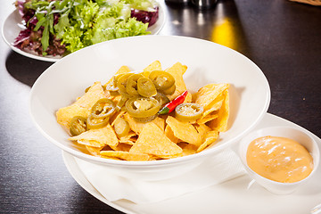 Image showing Nachos with cheese sauce and chilli pepperoni