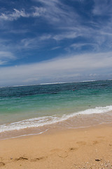 Image showing Beautiful tropical beach with lush vegetation