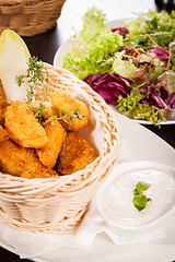 Image showing Crumbed chicken nuggets in a basket