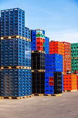 Image showing Stacks of beverage bottle crates