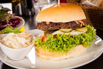 Image showing Cheeseburger with cole slaw 