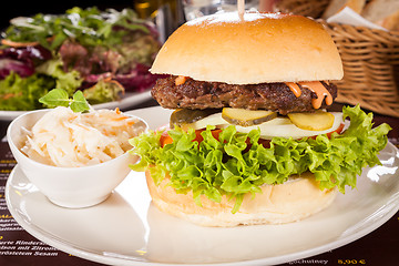 Image showing Cheeseburger with cole slaw 