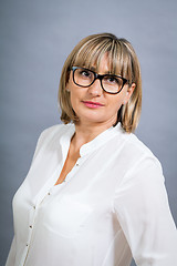 Image showing Scholarly attractive woman in glasses