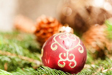 Image showing Red Christmas balls with pine cones