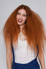 Image showing Female model playing with frizzy hair