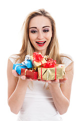 Image showing Female model carrying presents