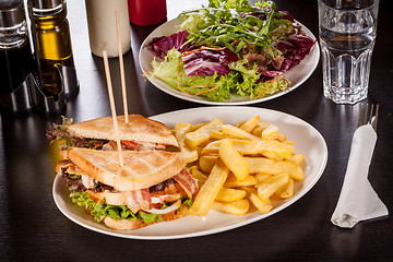 Image showing Club sandwich with potato French fries