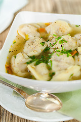 Image showing Dish of savory pork tortellini in broth pelmeni russian