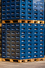 Image showing Stacks of beverage bottle crates