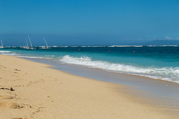 Image showing Beautiful tropical beach with lush vegetation