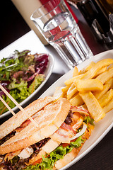 Image showing Club sandwich with potato French fries