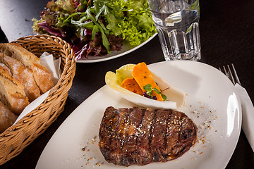 Image showing Grilled beef steak with seasoning