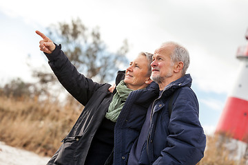 Image showing happy mature couple relaxing baltic sea dunes 