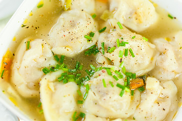 Image showing Dish of savory pork tortellini in broth pelmeni russian