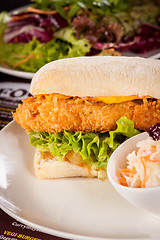 Image showing Burger with golden crumbed chicken breast