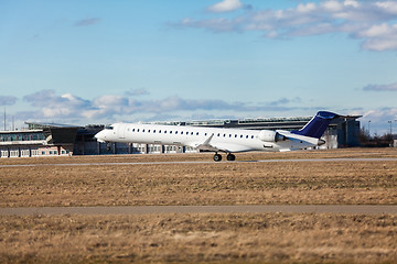 Image showing Passenger airliner taking off at an airport