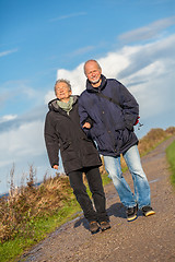 Image showing happy mature couple relaxing baltic sea dunes 