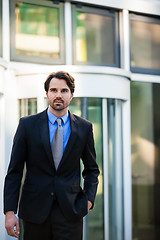 Image showing Businessman standing waiting for someone