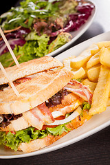 Image showing Club sandwich with potato French fries