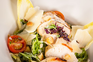 Image showing tasty fresh caesar salad with grilled chicken and parmesan 