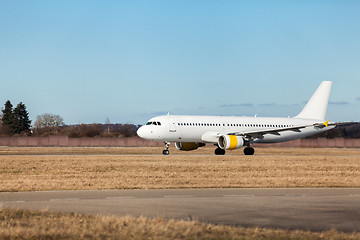 Image showing Passenger airliner taking off at an airport