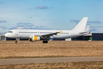 Image showing Passenger airliner taking off at an airport