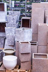 Image showing Glazed and unglazed ceramic flower pots