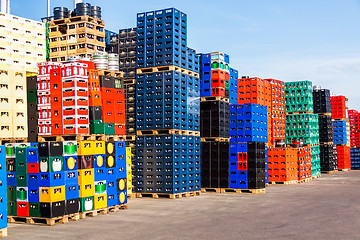 Image showing Stacks of beverage bottle crates