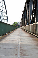 Image showing Empty railroad tracks on scale bridge