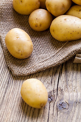 Image showing Farm fresh  potatoes on a hessian sack