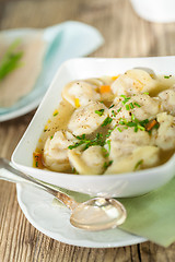 Image showing Dish of savory pork tortellini in broth pelmeni russian