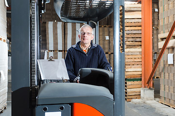 Image showing Posing reach truck driver