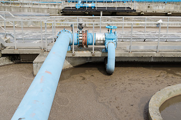 Image showing blue stopcock tap pipes oxygen blow bubble water 