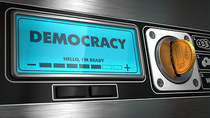 Image showing Democracy on Display of Vending Machine.