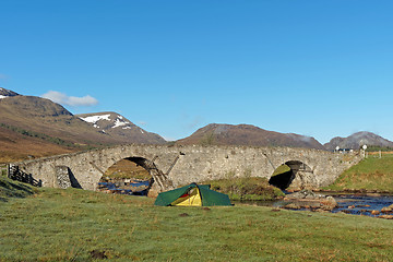 Image showing Tent by Spey river at Garva bridge, Scotland in spring