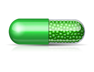 Image showing Medical green capsule with granules