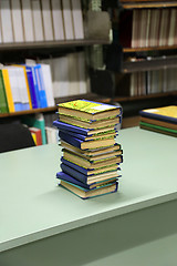 Image showing Stack of books on the table