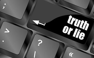 Image showing truth or lie button on computer keyboard key