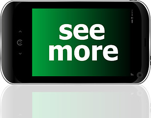 Image showing smartphone with word see more on display, business concept