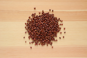 Image showing Adzuki, aduki or azuki beans on wood