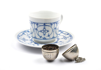 Image showing Tea cup and ball